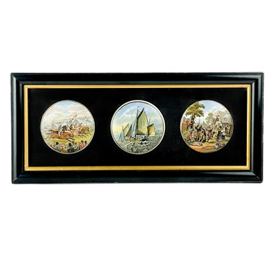 Lot 428 - Three framed Prattware pot lids.