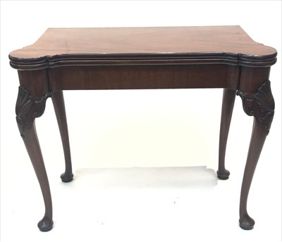 Lot 3334 - A George II mahogany concertina card table,...