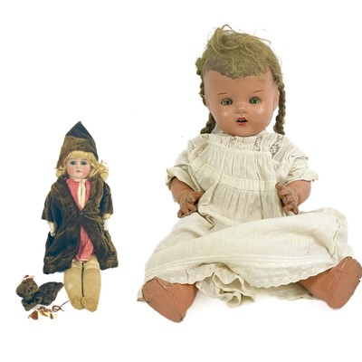 Lot 752 - Porcelain headed and a Pedigree composition dolls (x2)