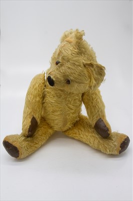 Lot 600V - An early 20th century articulated teddy bear...