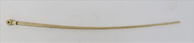 Lot 1185 - A 19th century scrimshaw whale bone and baleen...