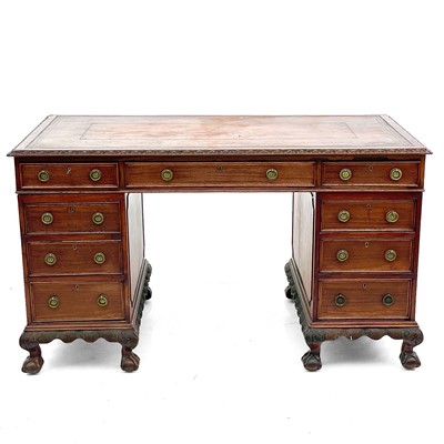 Lot 724 - A Georgian style mahogany twin pedestal writing desk.