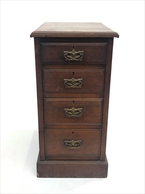 Lot 3314 - An Edwardian walnut four drawer pedestal chest.