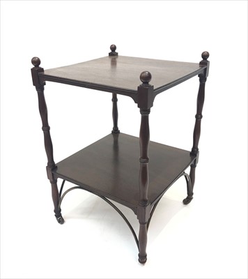 Lot 3315 - A 19th century mahogany two tier stand.