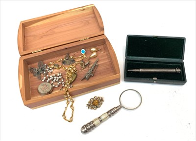 Lot 2436 - A Victorian silver brooch with two colour gold...