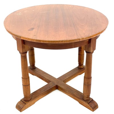Lot 694 - A Robin Nance circular walnut occasional table.