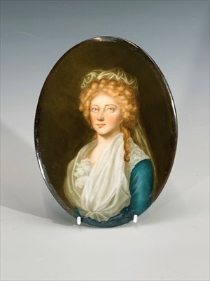 Lot 1474 - A Victorian Staffordshire figure of a girl...