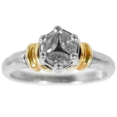 Lot 209 - A contemporary 18ct bi-colour diamond set three stone ring.