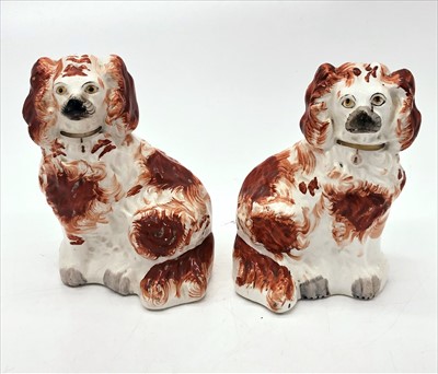 Lot 1477 - A pair of Victorian Staffordshire red and...