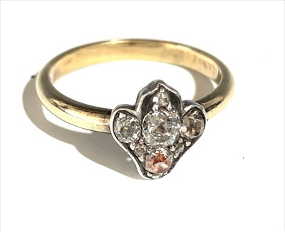 Lot 2491 - A 9ct gold ring set with diamonds.