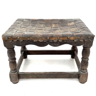Lot 681 - An early 20th century oak stool.