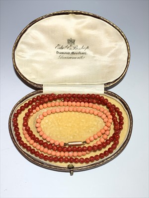 Lot 2677 - A pink coral necklace with 9ct. clasp and a...