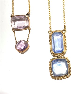 Lot 2675 - Two gold necklaces one with a pair of pale...