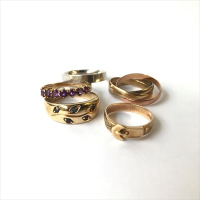 Lot 2682 - A 9ct gold three colour triple ring and four...