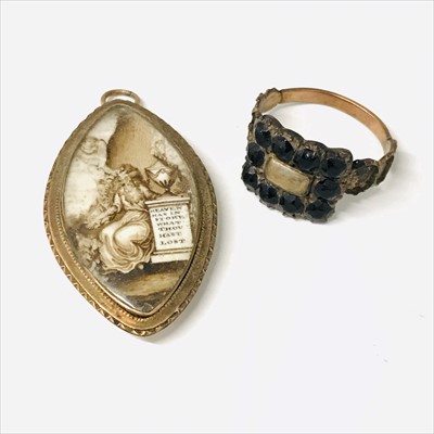 Lot 2700 - A George III mourning gold pendant of...