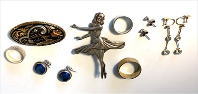 Lot 2650 - Silver dancer, reindeer gilt brooch, two...