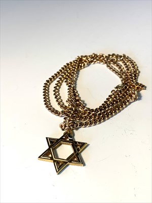 Lot 2647 - Gold star on chain