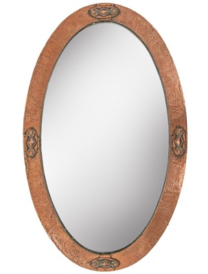Lot 743 - An Art Nouveau copper oval mirror.