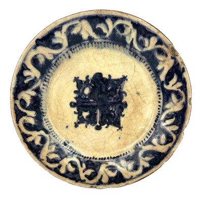 Lot 283 - A Persian blue and white pottery plate, 17th century.