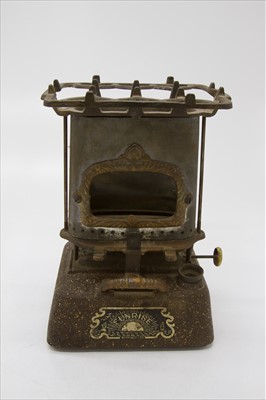Lot 389 - An early 20th century Rippingilles 'Sunrise'...