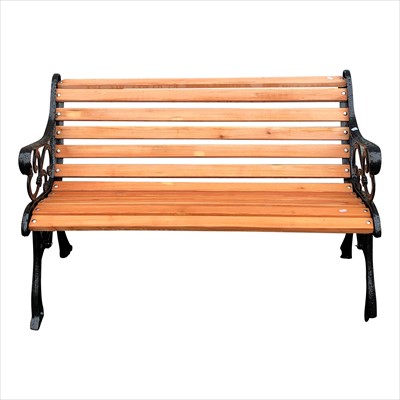 Lot 3357 - A black painted cast iron garden bench, with...