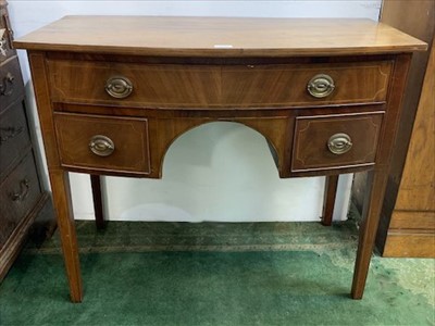 Lot 3344 - A mahogany bow front sideboard, early 19th...