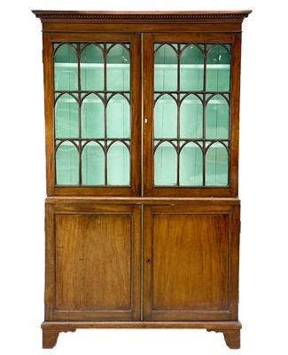 Lot 747 - A 19th century mahogany bookcase cabinet.