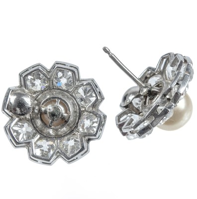 Lot 217 - An impressive early 20th century cultured pearl, diamond set, double-row necklace & earrings suite.