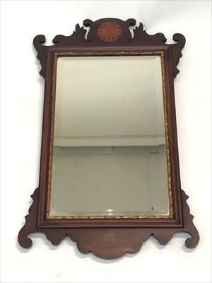 Lot 3351 - A George III style mahogany wall mirror.
