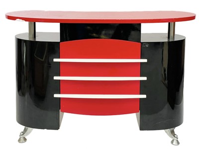 Lot 689 - A Dir Janus black and red laminated Barbers or shop cabinet.