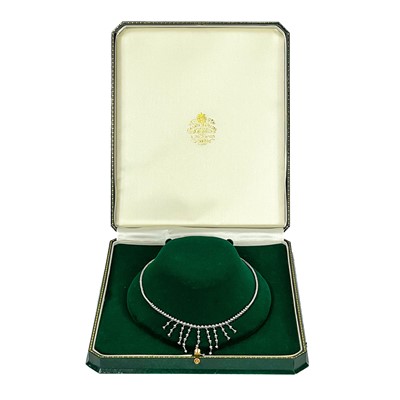 Lot 101 - A contemporary 18k white gold diamond set fringe necklace.