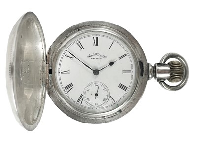 Lot 28 - A Waltham white metal cased full hunter crown wind lever pocket watch.