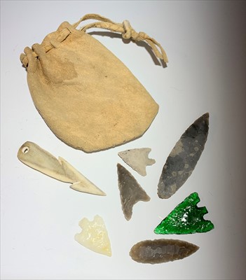 Lot 2538 - An opal arrow head, a green glass arrow head...
