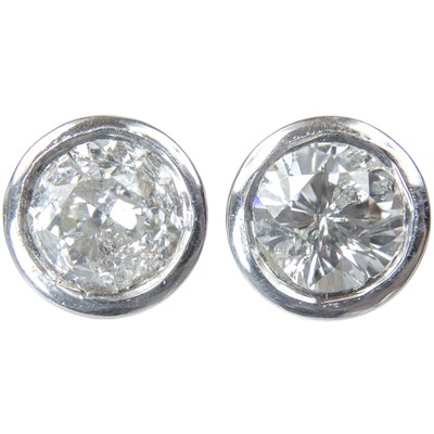 Lot 136 - A pair of 9ct white gold diamond set stud earrings, each is 1ct approximately.