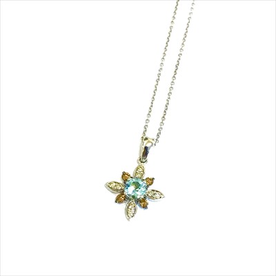 Lot 2544 - A 14ct gold diamond and aquamarine pendant by...