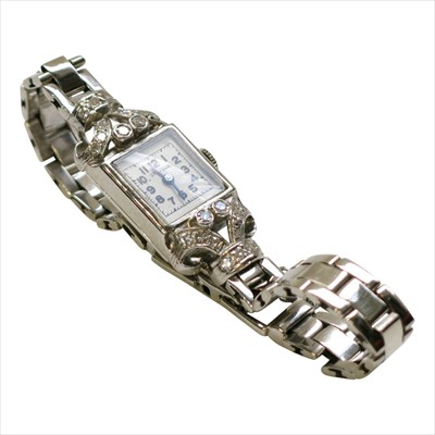 Lot 2546 - A 14ct white gold diamond set cocktail watch,...