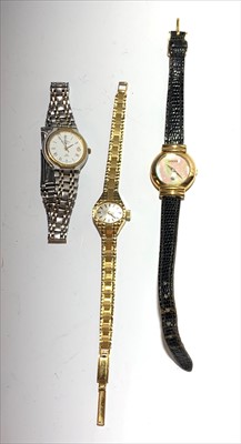 Lot 2571 - A Ladies Gucci pearl dial wristwatch and two...
