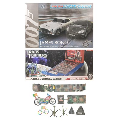Lot 886 - Micro Scalextric James Bond Set Transformers table pinball etc