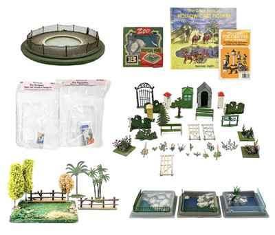 Lot 876F - Lead and plastic zoo and garden accessories and lead reference books.