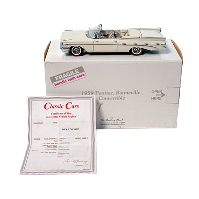 Lot 891 - Danbury Mint 1959 Pontiac Bonneville Convertible 1:24