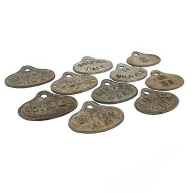 Lot 8 - A group of ten cast metal cellar beer labels.