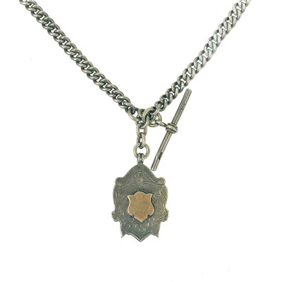 Lot 88 - A silver hallmarked double Albert watch chain with a shield fob.