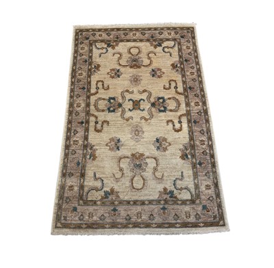 Lot 1238 - A Ziegler Chobi rug, the ivory field with...