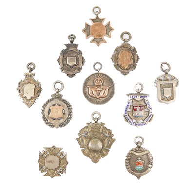 Lot 68 - A collection of eleven hallmarked silver shield fobs.