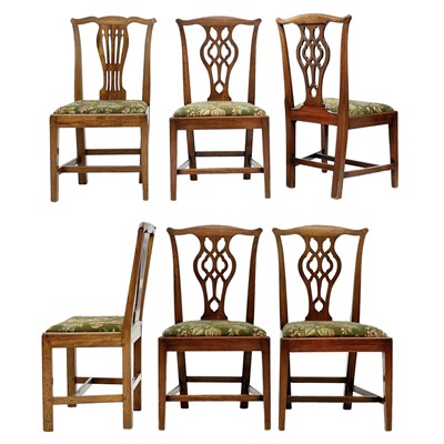 Lot 657 - A set of three George III mahogany dining chairs.