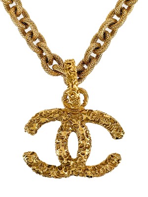 Lot 494 - A Chanel 24ct gold-plated lava collection large CC pendant necklace, circa 1993.