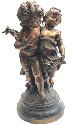 Lot 495 - A spelter group of a boy and girl, 19th...