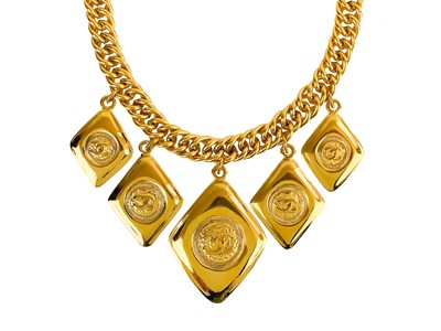 Lot 374 - A Chanel 24ct gold-plated five CC medallion choker necklace, circa 1990/91.