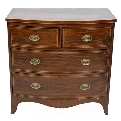 Lot 696 - A late George III mahogany and chequer strung bow front chest.