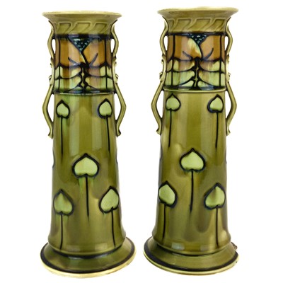 Lot 606 - A pair of Minton Secessionist vases.